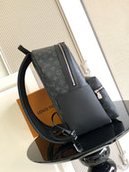 Louis Vuitton monogram backpack with side handle and front zipper