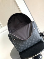 Louis Vuitton monogram backpack open-top view with grey fabric lining