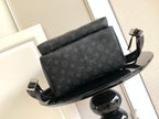 Louis Vuitton monogram backpack with top flap and front hardware
