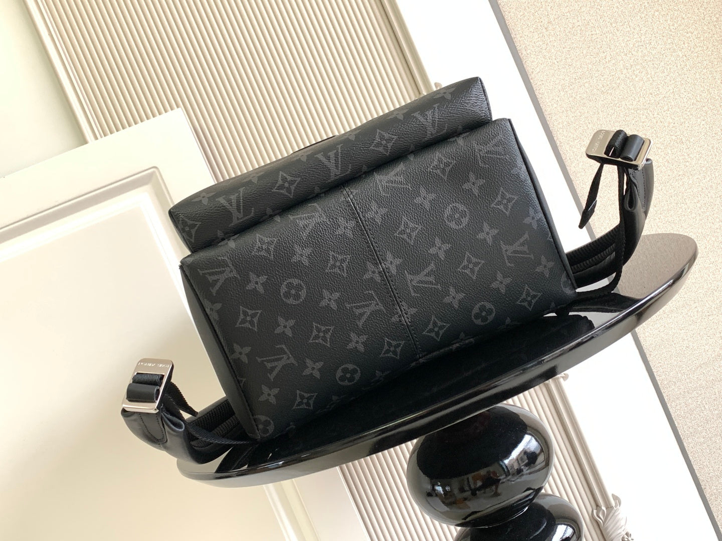 Louis Vuitton monogram backpack with top flap and front hardware