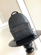 Louis Vuitton checkered mini backpack with top handle, dark gray, zip front pocket