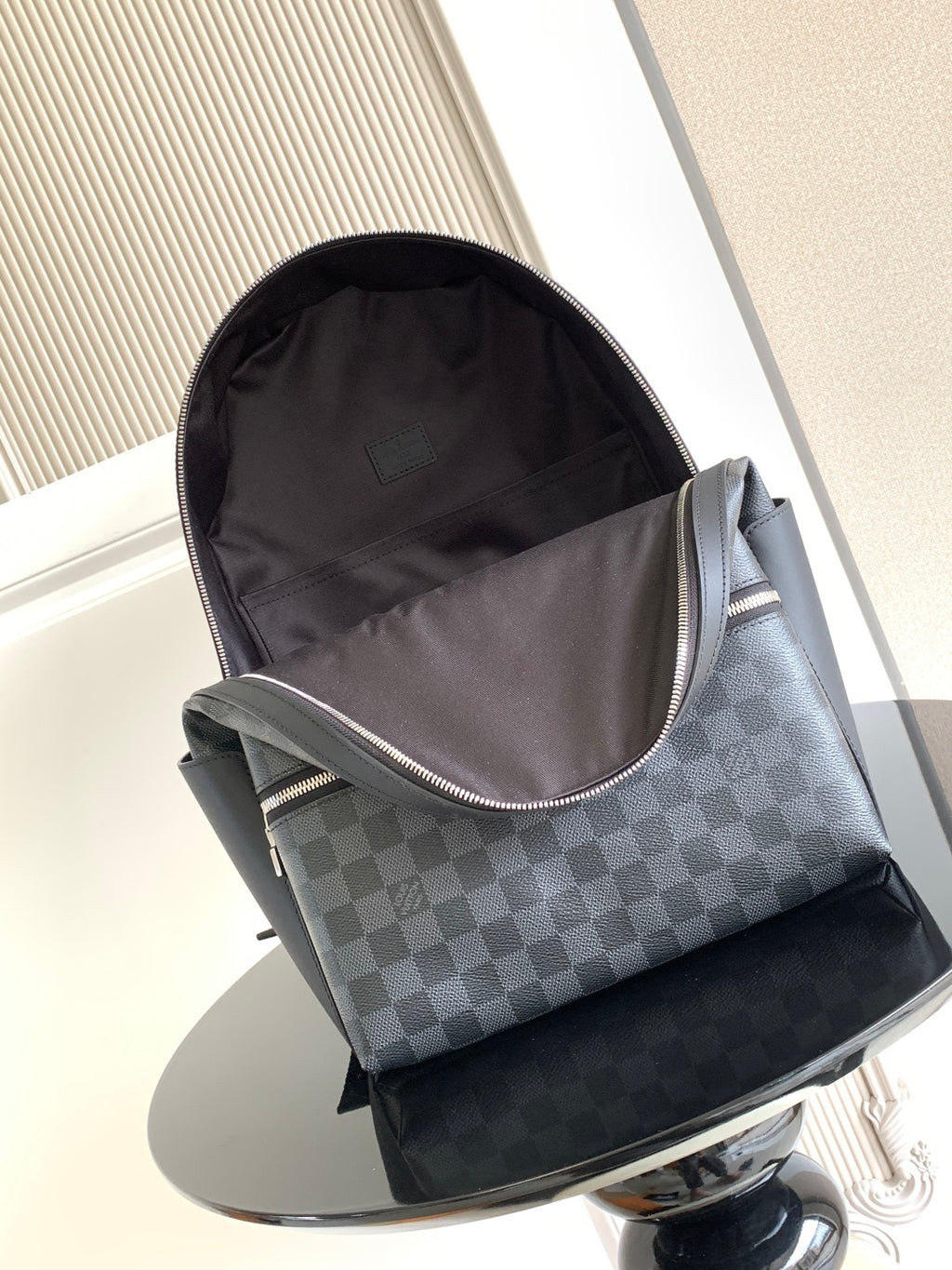 Louis Vuitton checkered mini backpack with fabric lining, top zipper opening