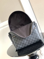 Louis Vuitton checkered mini backpack with fabric lining, top zipper opening