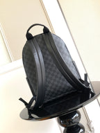 Louis Vuitton checkered backpack with adjustable straps and top handle, dark gray