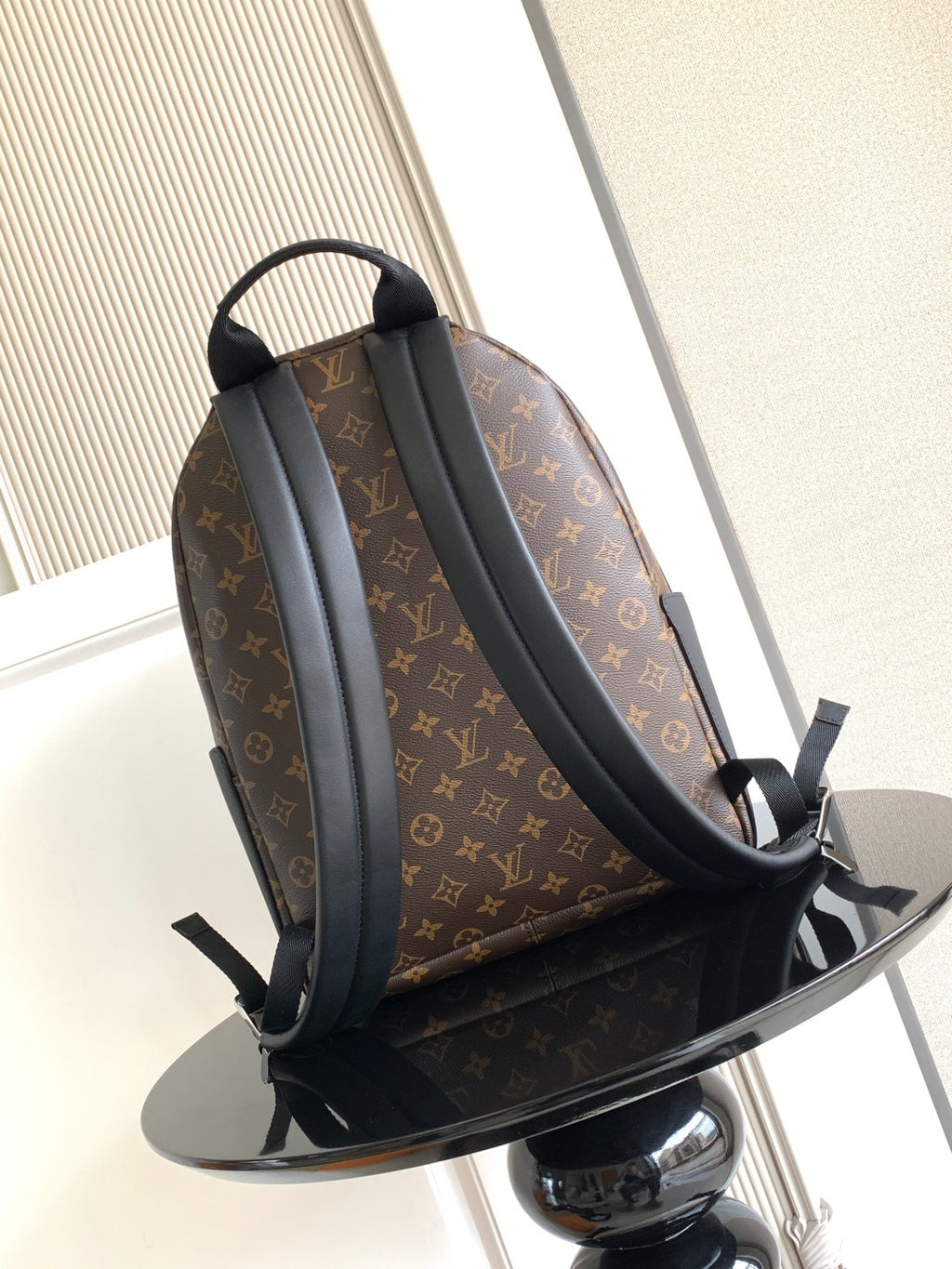 Louis Vuitton monogram backpack with two adjustable shoulder straps