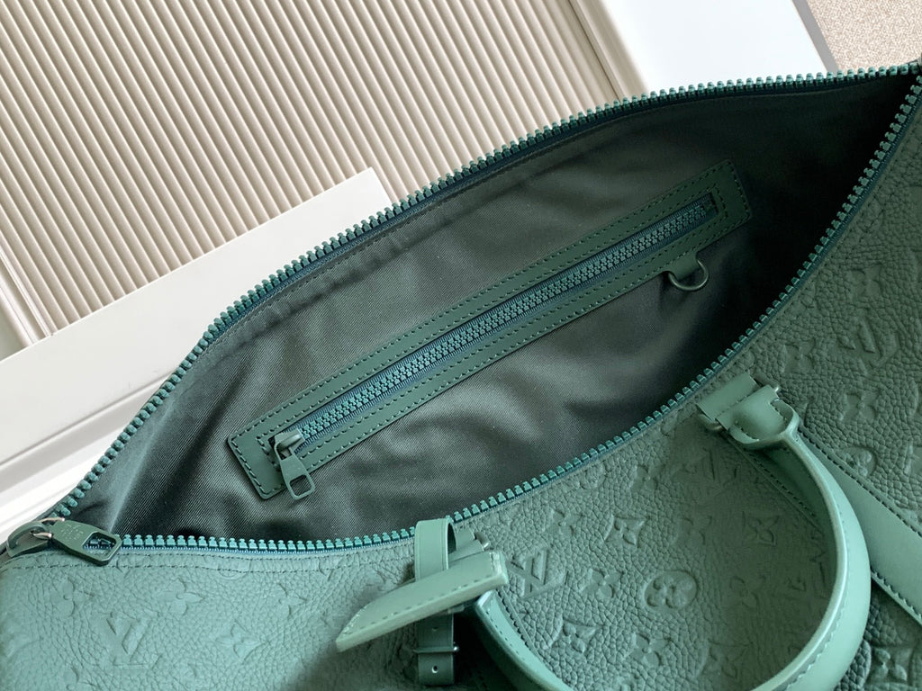Louis Vuitton green monogram duffel bag interior lining with zip pocket