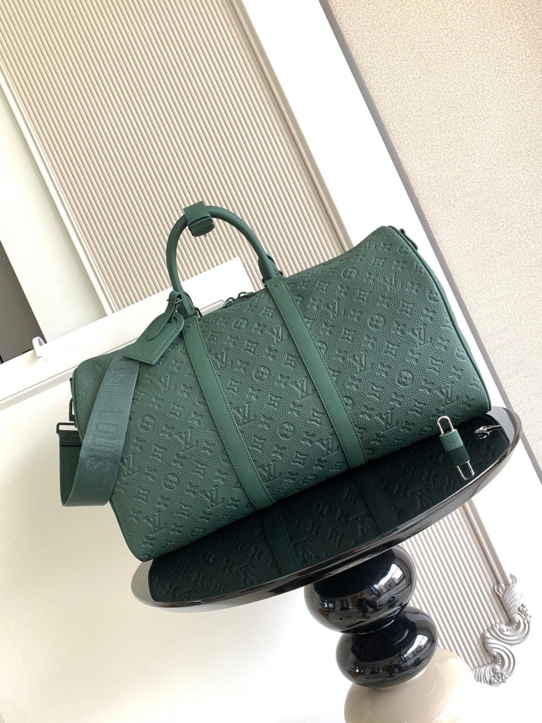 Louis Vuitton green monogram duffel bag with top handles and shoulder strap