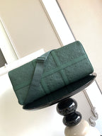 Louis Vuitton green monogram duffel bag with crossbody strap and front flap