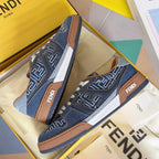 Denim Fendi sneakers with FF monogram, tan trim and white lace-up front.