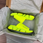 Balenciaga neon green sandals in crinkled tissue paper packaging