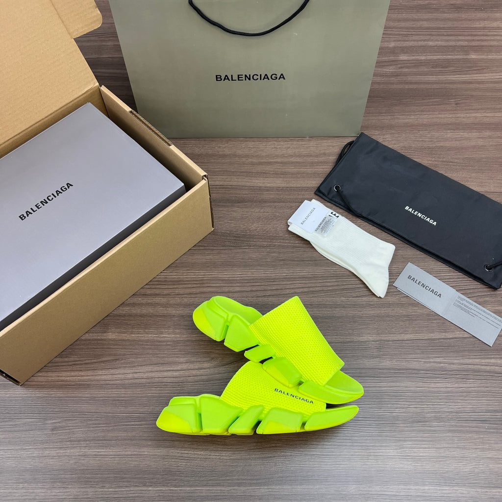 Balenciaga neon green slide sandals, front view, chunky platform base