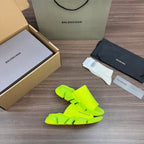 Balenciaga neon green slide sandals, front view, chunky platform base