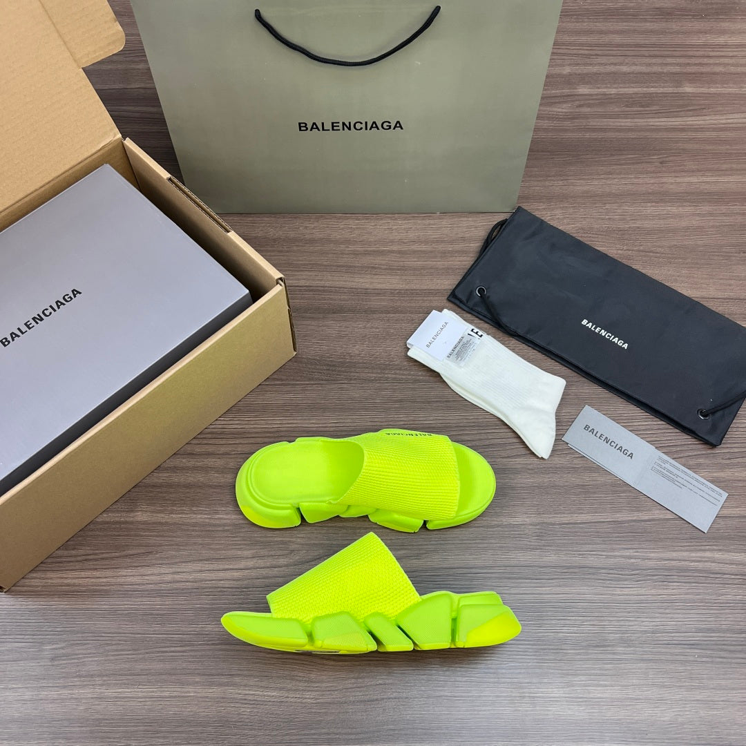 Balenciaga neon green slide sandals, side view, cushioned sole