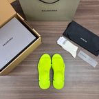 Balenciaga neon green sandals, upright pair view, thick platform sole