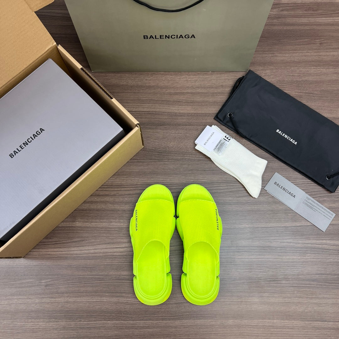 Balenciaga neon green sandals, upright pair view, thick platform sole