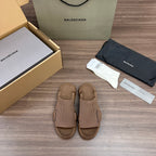 Tan knit sandal slides with cross straps and molded rubber sole