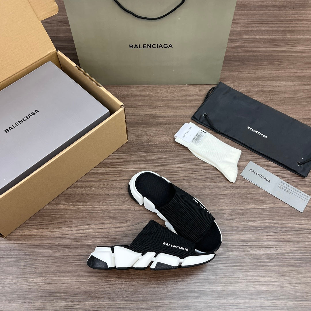 Balenciaga slide sandals, black knit upper with white chunky sole