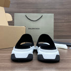 Balenciaga slide sandals, black back with white sole and heel logo