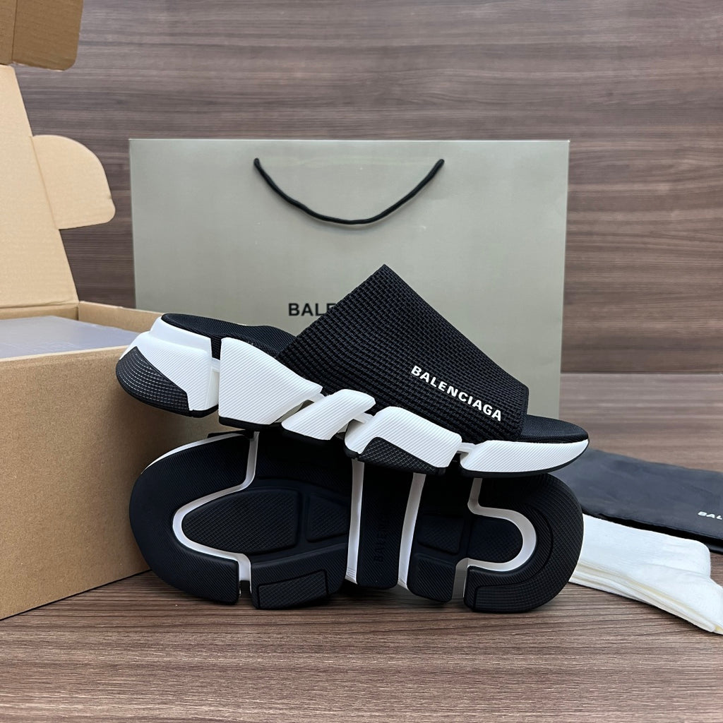 Balenciaga slide sandals, black footbeds with white straps and chunky outsole