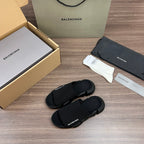 Balenciaga dark knit slide sandals with logo strap and thick sole