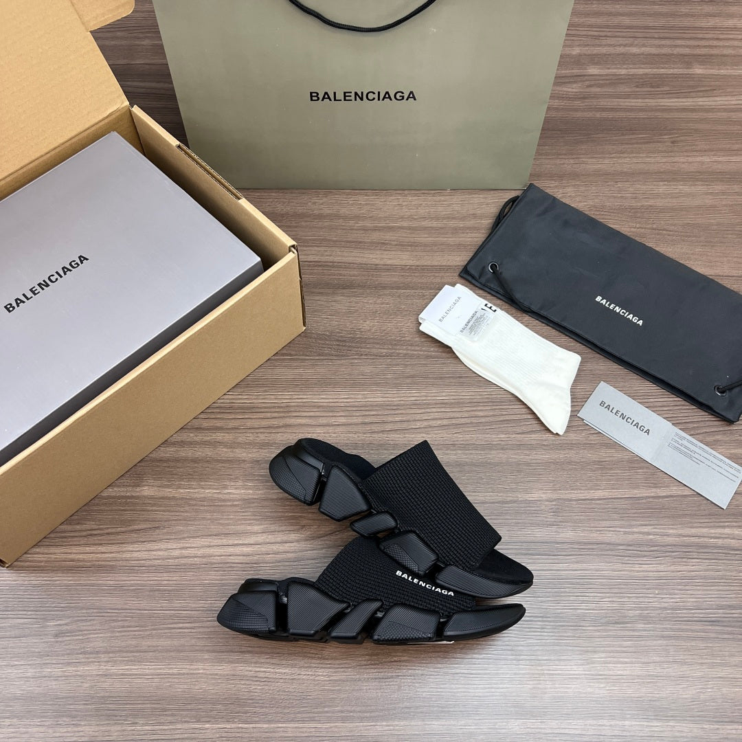 Balenciaga dark knit slide sandals with wide buckle strap and chunky sole
