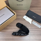 Balenciaga dark knit slide sandals with molded sole and logo strap