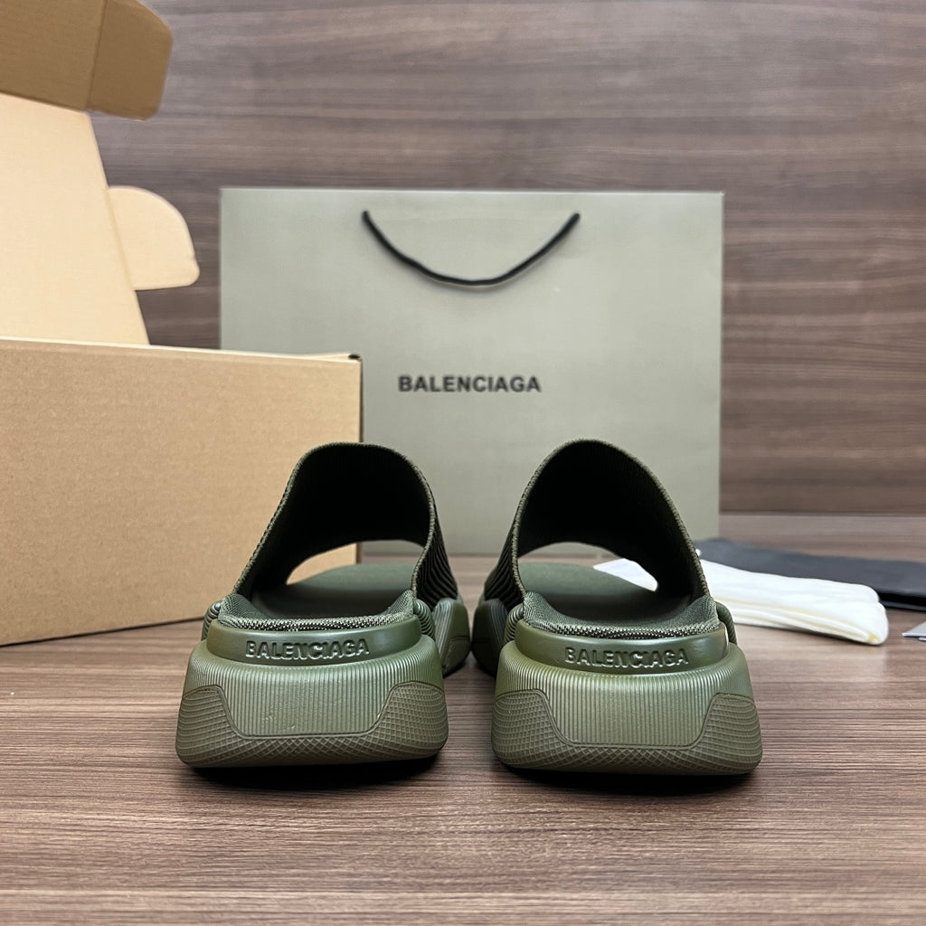 Dark green knit slide sandals with thick sole and rear heel opening