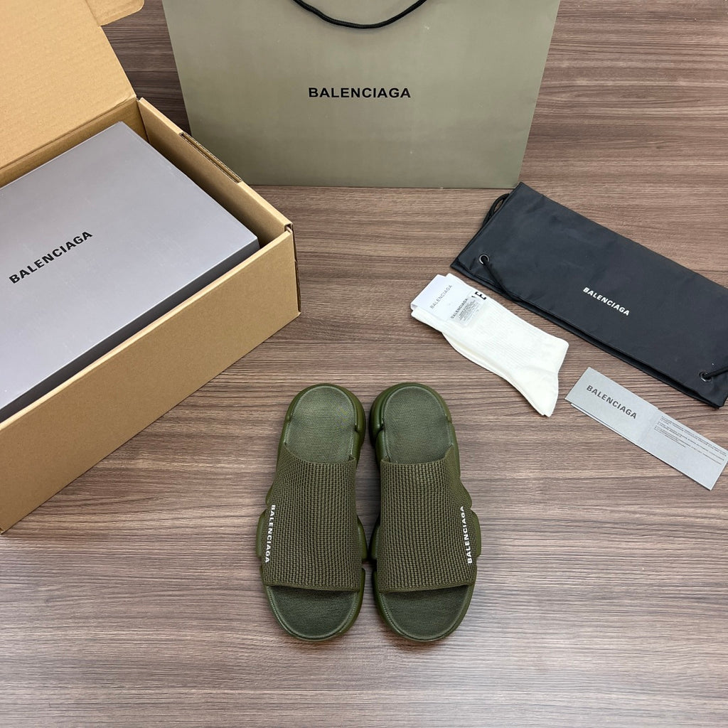 Balenciaga green knit slide sandals with wide straps and cushioned footbed