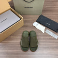 Balenciaga green knit slide sandals with wide straps and cushioned footbed