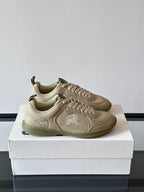 Burberry low-top lace-up sneakers, cream leather uppers, rubber sole