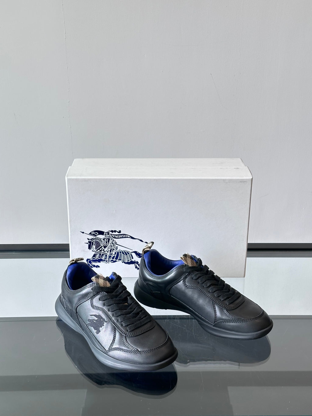 Burberry lace-up sneakers, dark leather with blue interior and embossed side logo