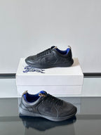 Burberry lace-up sneakers on box, dark finish with blue interior collar