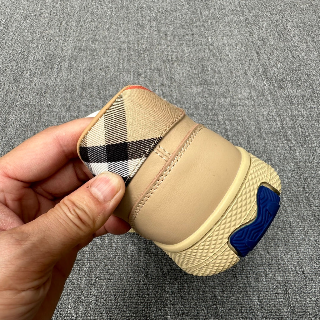 Beige sneaker heel with plaid lining and textured sole edge