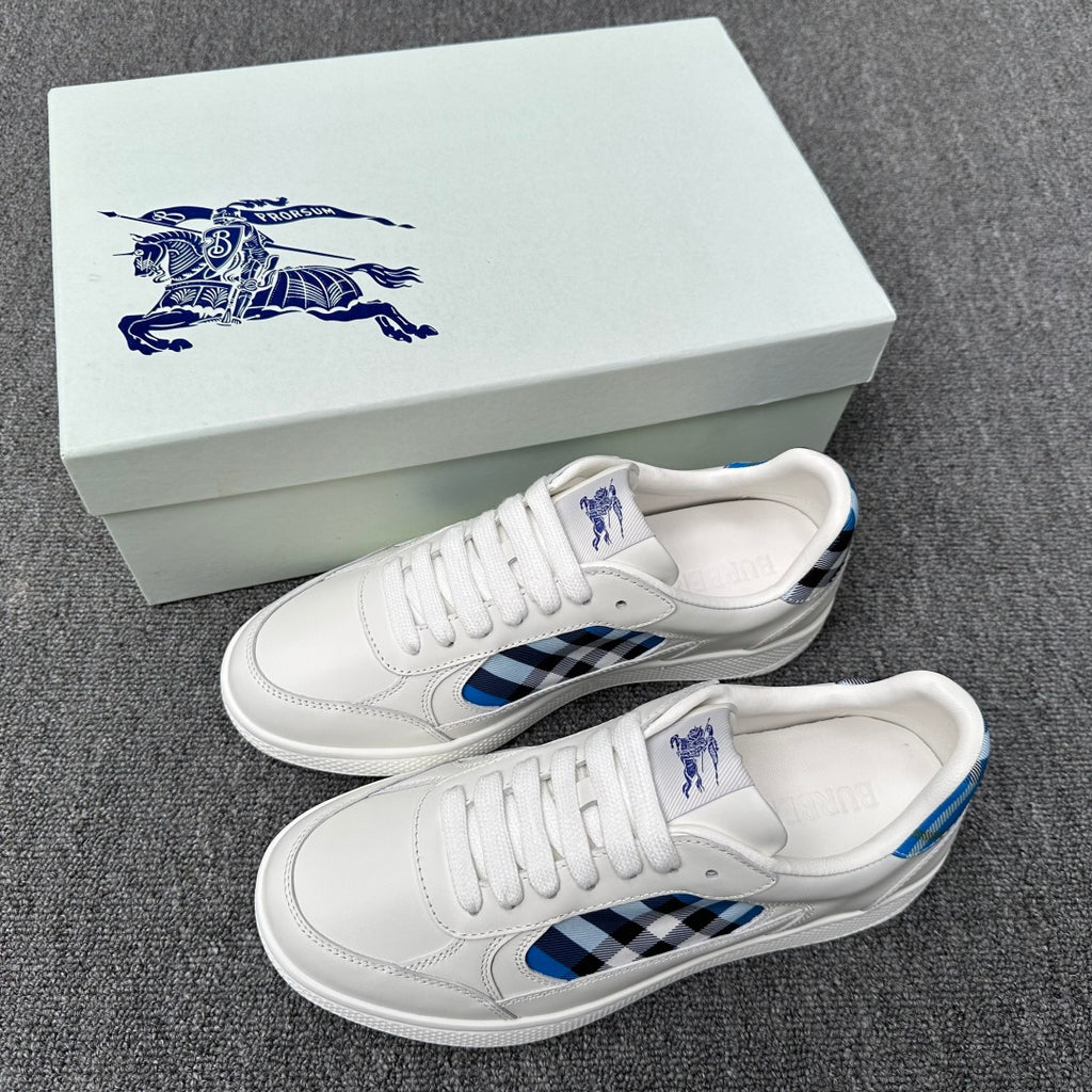 Burberry luxury white sneakers with blue and black check side panel and lace-up design