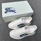 Burberry luxury white sneakers with blue and black check side panel and lace-up design