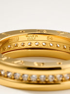 Bvlgari gold-tone bracelet with MADE IN ITALY text and round stones, close-up