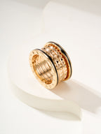 Bvlgari gold-tone ring set, angled view showing textured outer bands