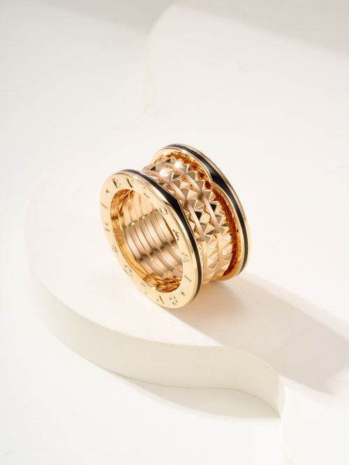 Bvlgari gold-tone ring set, angled view showing textured outer bands