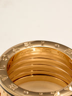 Bvlgari gold-tone ring inner band close-up with stamped icons and numbers