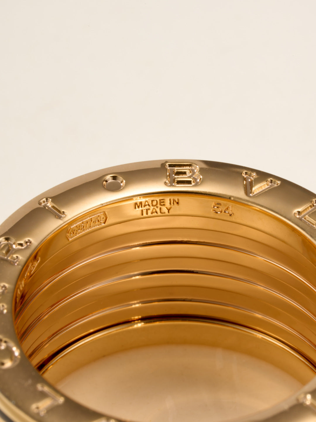 Bvlgari gold-tone ring inner band close-up marked "MADE IN ITALY"
