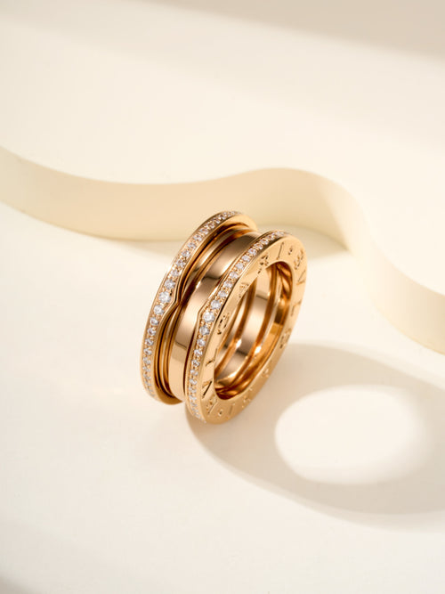 Gold double-ring set with diamond pavé accents on the outer band