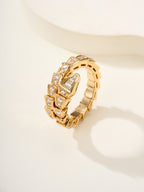 Bvlgari diamond ring, gold-tone linked band with square-cut stones, angled view