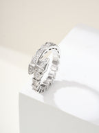 Bvlgari diamond ring, silver-tone linked band with square-cut stones on pedestal