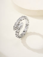 Bvlgari diamond ring, silver-tone linked band with square-cut stones, angled view