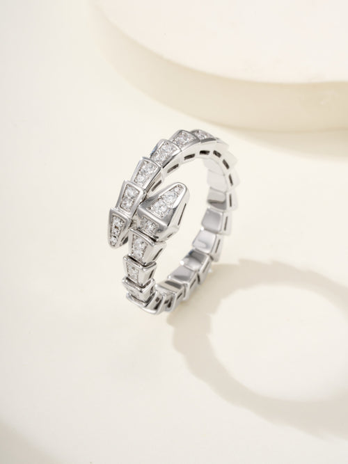 Bvlgari diamond ring, silver-tone linked band with square-cut stones, angled view