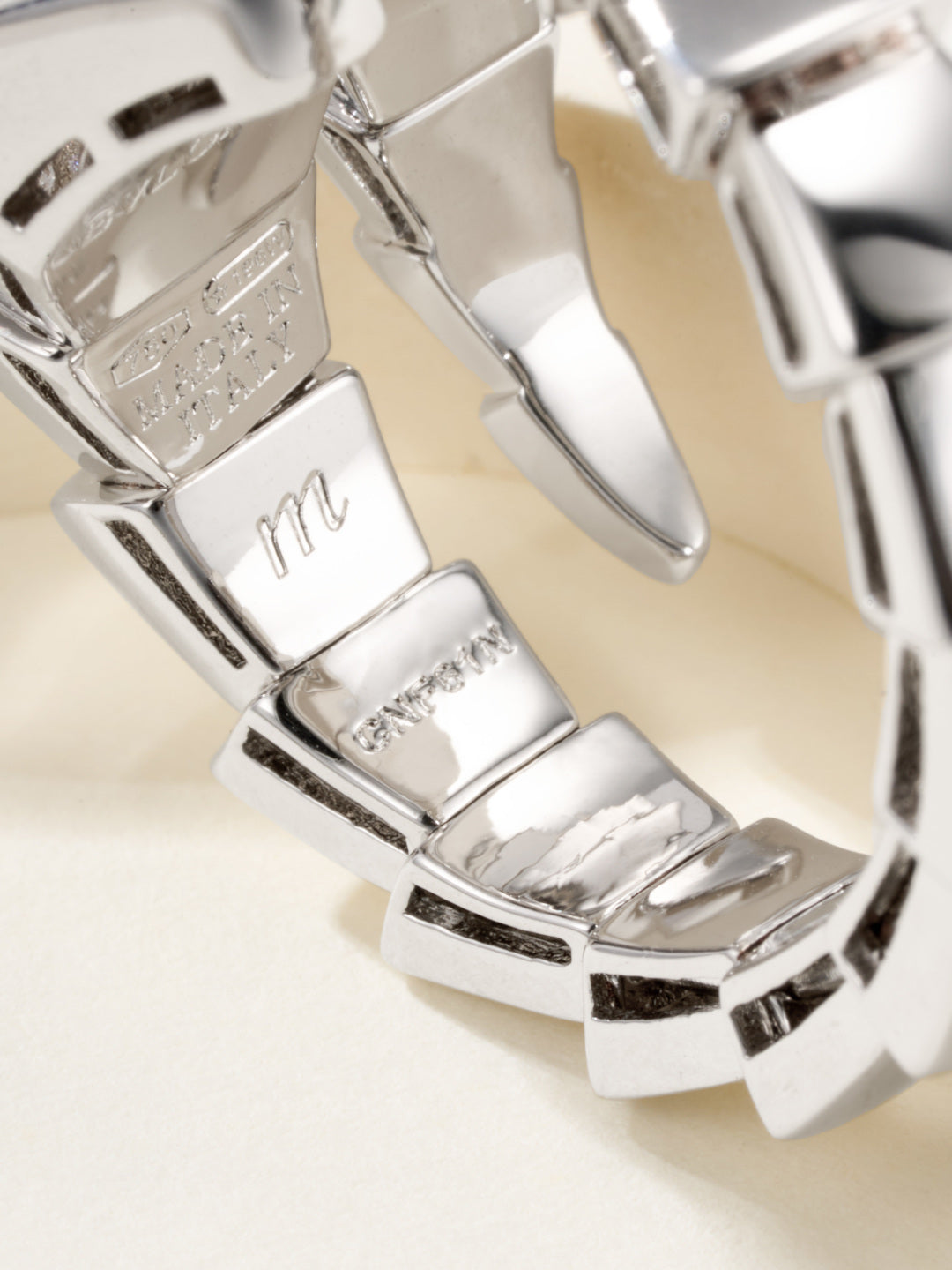 Bvlgari watch bracelet close-up in silver-tone with engraved details and pavé accents