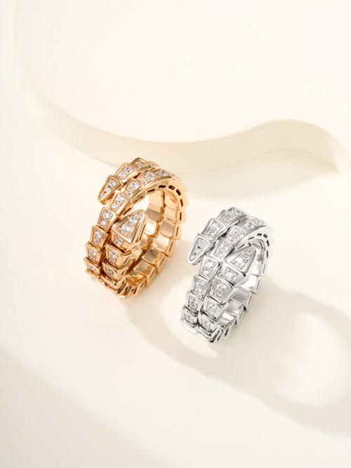 Bvlgari pavé band rings, gold-tone and silver-tone, square crystal settings