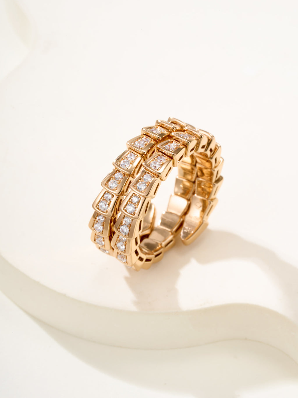 Bvlgari gold-tone pavé band ring with square crystal insets