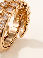 Gold-tone bracelet with linked square links and crystal stones, AU 750 engraving
