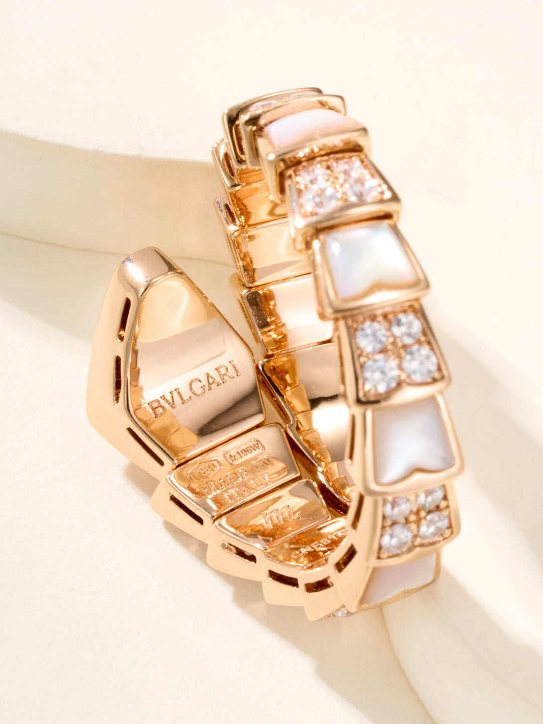 Rose gold-tone bracelet with Bvlgari engraving and square crystal bezel link details